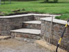 Mortar bedded Stone walls and steps.